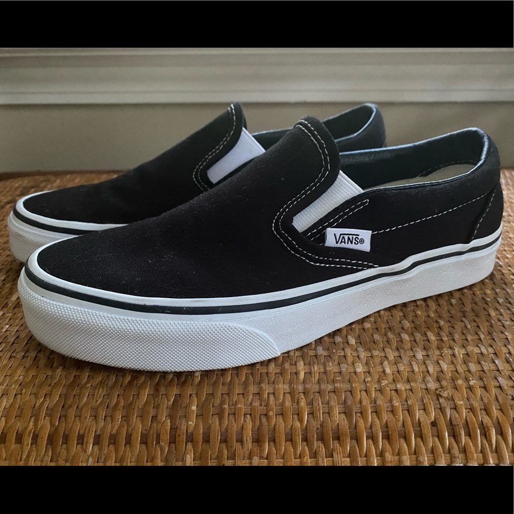 Classic black Vans slip-ons